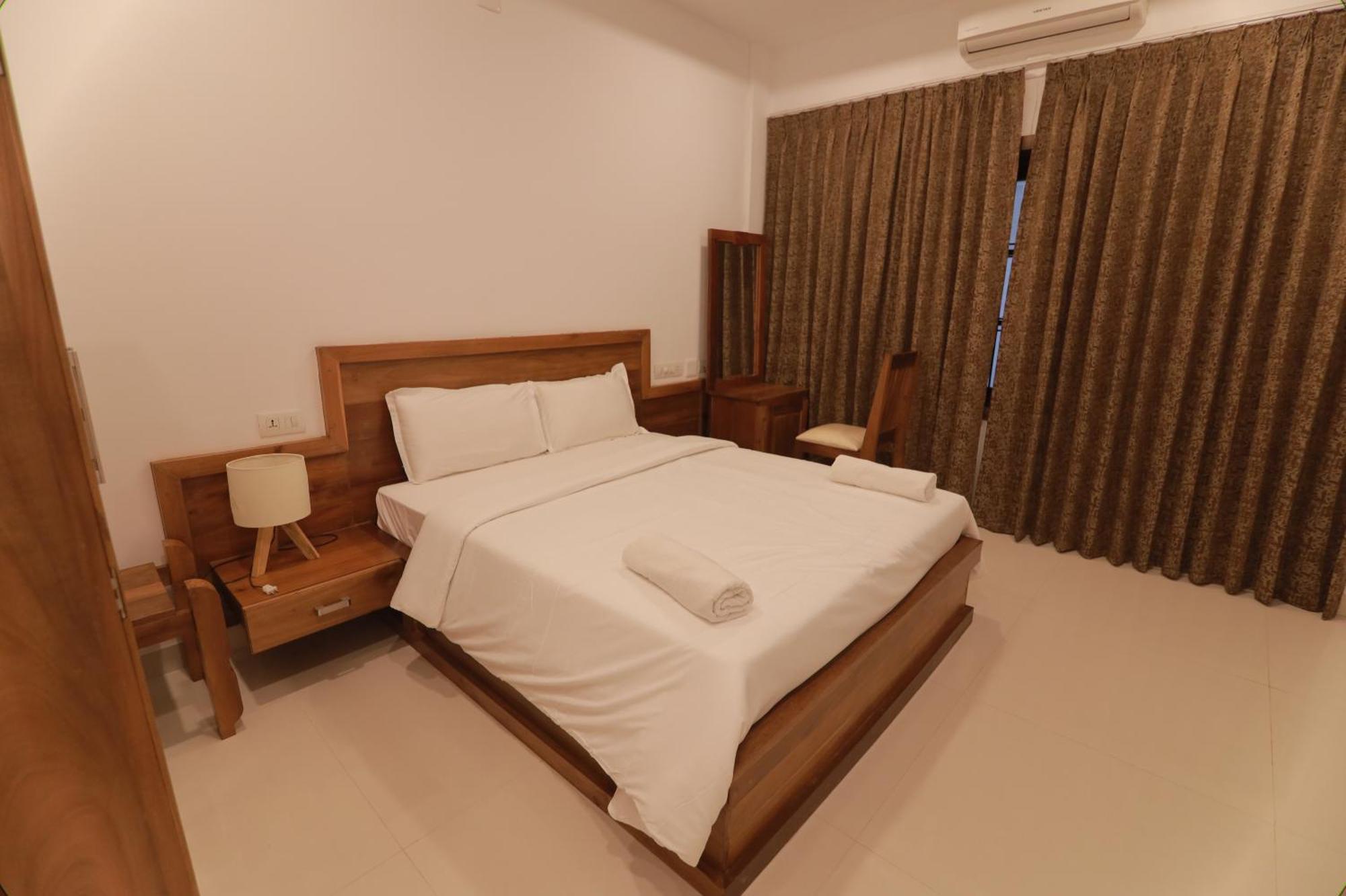 Opm Inn Payyannur Exterior photo
