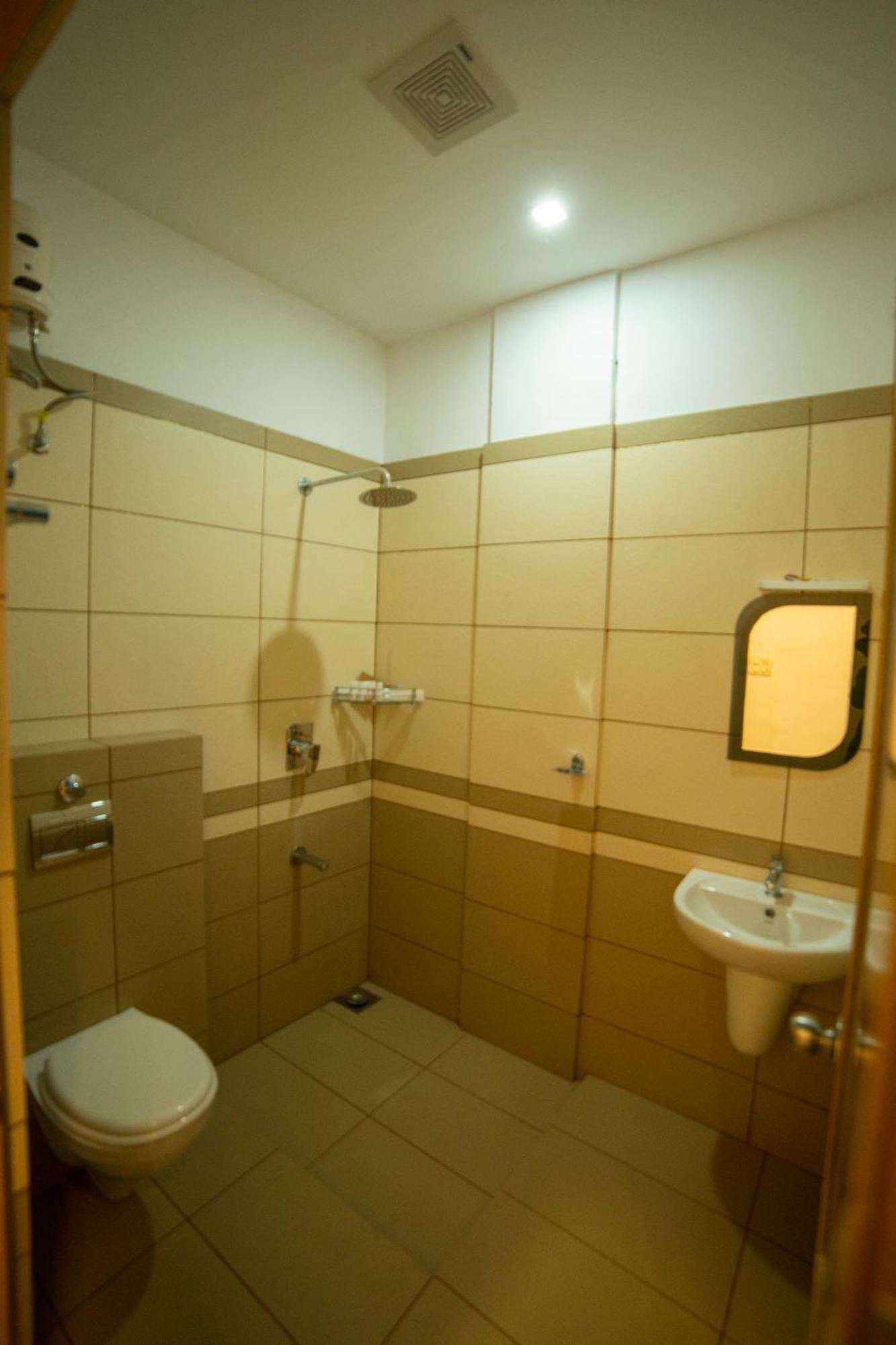 Opm Inn Payyannur Exterior photo